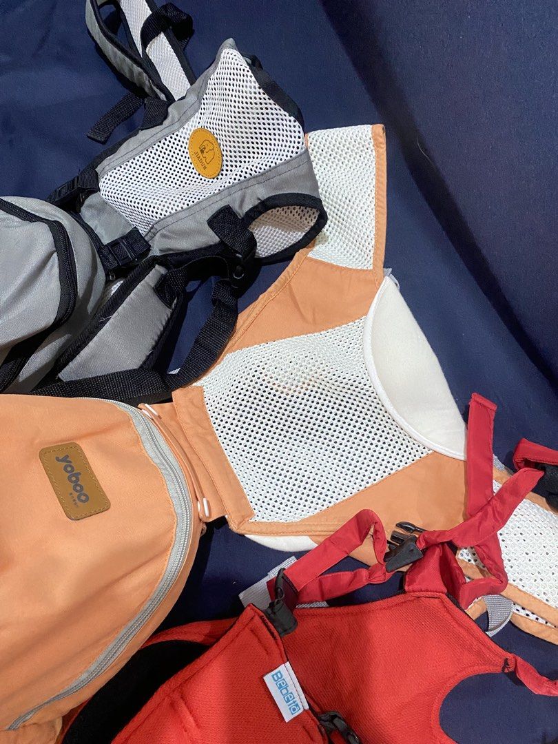 Yoboo Baby Carrier Set and Walking Support (Category: Carriers & Slings) located in San Narciso. Submitted by boypablo1998 (Listing ID 1430565791, Image 1). Description: Yoboo baby carrier features a breathable mesh design for comfort. It has a zippered pocket for small items and adjustable straps. It is designed to securely hold your baby while allowing you to keep your hands free..