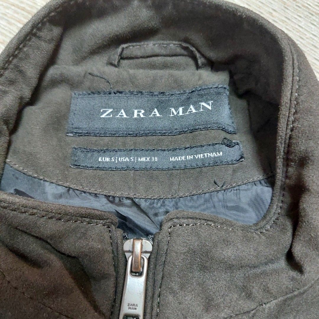 Zara Man Suede Bomber Jacket - Small (Category: Coats, Jackets and Outerwear) located in Paranaque City. Submitted by jerassic (Listing ID 1430524476, Image 3). Description: Zara Man Brown Suede Bomber Jacket P450 Size Small on tag Issue - buttons on wrist of sleeves faded metal Dimensions L - 25 in W - 20 in Location: BF Homes Parañaque Meetups: BF Parañaque, Alabang, or Las Piñas :) Shipping available via your courier of choice at your expense 