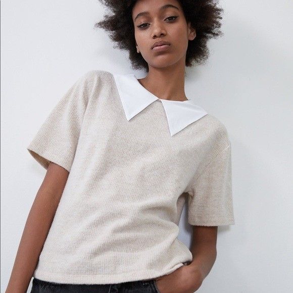 Zara Top with White Collar (Category: Blouses) located in Imus. Submitted by tinph (Listing ID 1430431817, Image 3). Description: Zara top with a white collar. It has short sleeves and a textured beige fabric. The tag indicates size S and that it was made in Morocco. The top has a relaxed fit and a classic design, suitable for various occasions. very light unnoticeable penmark on the collar MOP: BDO/BPI/Gcash Shipping ( shouldered by buyer) 📍IMU