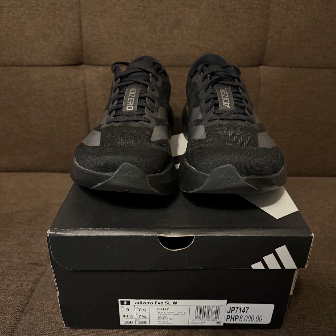 adidas adizero Evo SL W (Category: Sneakers) located in Pasay City. Submitted by joshwhacker (Listing ID 1430770591, Image 2). Description: Adidas Adizero Evo SL W running shoes in black. Features the Adidas logo on the heel and sides. The box indicates a size 9 (US). The soles have Continental branding..