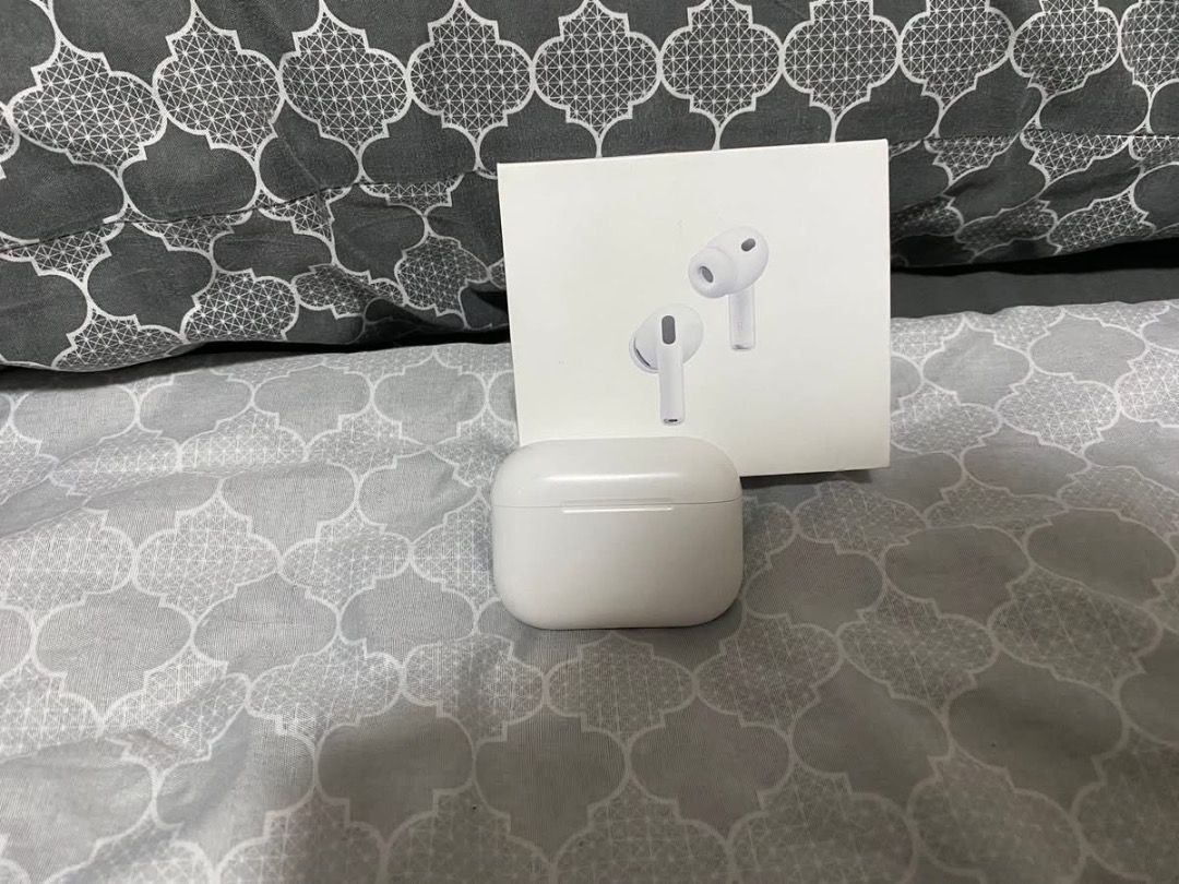 AIRPODS PRO 2 (Category: Earphones) located in Caloocan City. Submitted by mrbigdreams (Listing ID 1430709671, Image 3). Description: Includes the AirPods Pro, charging case, and various ear tips. Also comes with a black Spigen case and a black protective cover. The box is included. The earphones and case are white..