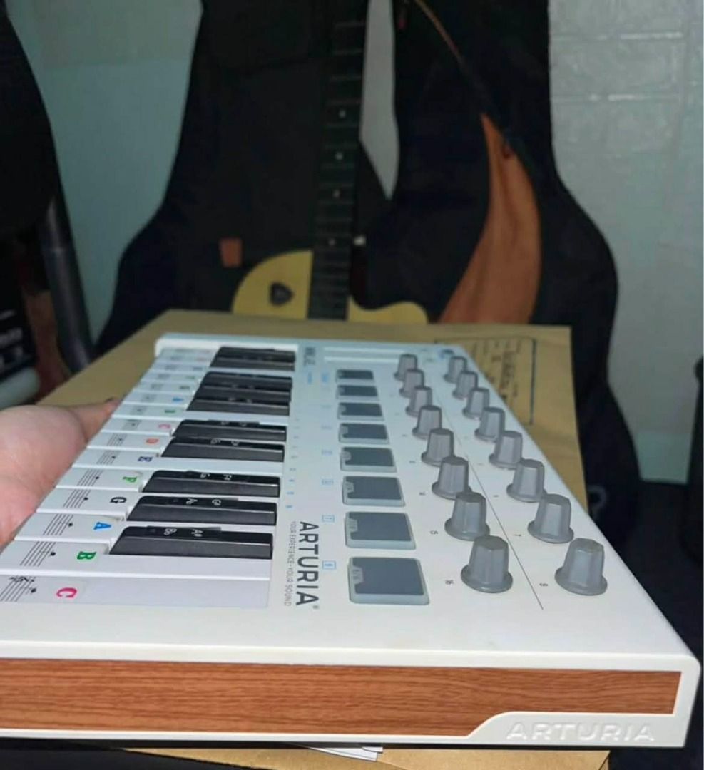 Arturia MiniLab MkII Universal MIDI Controller (Category: Musical Instruments) located in Caloocan City. Submitted by ellaeya28 (Listing ID 1430749112, Image 3). Description: Arturia MiniLab MkII Universal MIDI Controller. Features 25 velocity-sensitive mini-keys, 8 pads, and 16 rotary encoders. Includes pitch and modulation touch strips. Compact design for easy portability. Perfect for music production and performance. The images show the produc