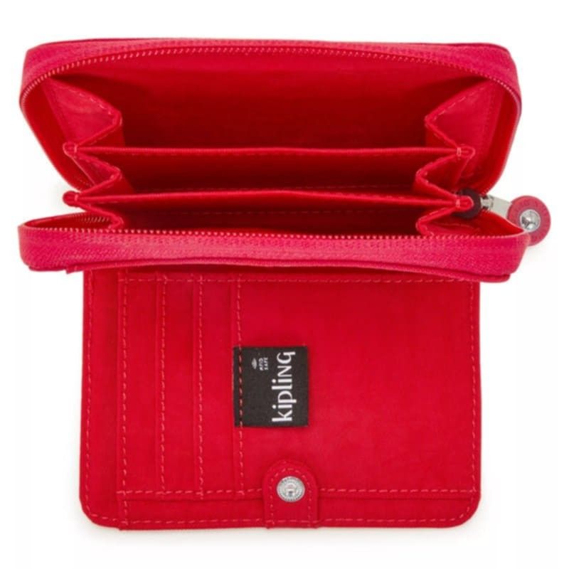 Authentic Kipling Money Love Red Rouge Wallet (Category: Wallets & Card holders) located in Davao. Submitted by jilly07 (Listing ID 1430718536, Image 2). Description: Kipling wallet features multiple card slots, a zippered compartment, and a snap closure. The interior includes a clear ID window and additional storage. The wallet has a zip-around closure and the Kipling logo is visible inside. Used only ONCE to check. GOOD as NEW. In EXCELLENT con