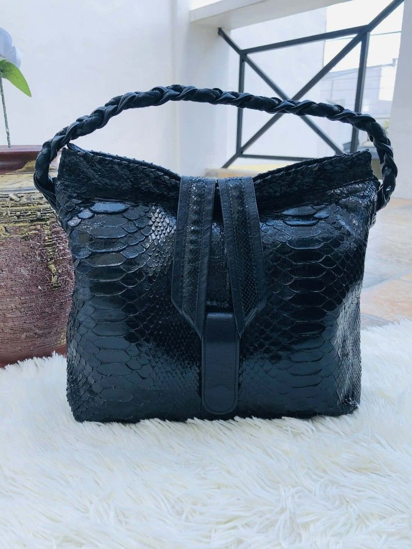 AUTHENTIC TAKECHI JAPAN Genuine Python Snakeskin Hobo Bag - Luxury Exotic Leather (Category: Luxury Bags & Wallets) located in Manila. Submitted by the_quality_archive_ph (Listing ID 1430769183, Image 2). Description: Elevate your collection with this stunning, 100% authentic Takechi Japan hobo bag. Takechi is a premier Japanese luxury brand world-renowned for its exquisite craftsmanship and use of high-grade exotic skins. This piece is a testame