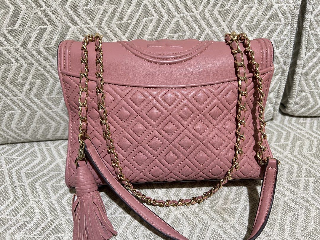 AUTHENTIC Tory Burch Fleming (Category: Luxury Bags & Wallets) located in Tagaytay City. Submitted by marielfradez (Listing ID 1430687273, Image 2). Description: ~~LAST PRICE~~ AUTHENTIC‼️ Tory Burch Fleming in quilted nappa leather Gift from US. Bought for almost 30k if in php, see price tag. Never been used, naka stock lang matagal sa cabinet. Issue: Minimal dents from storage. See pics 4&5..