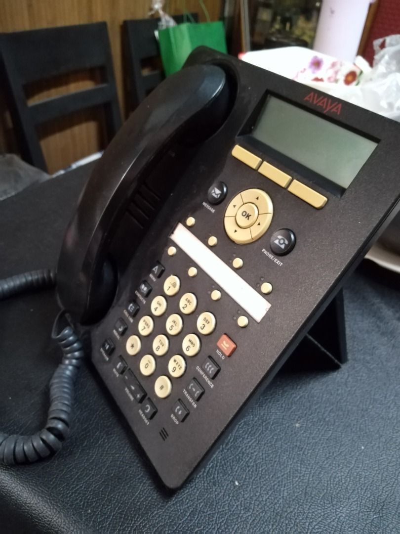Avaya 1608 IP Digital Telephone (Category: Other Gadgets) located in Manila. Submitted by maybonifacio (Listing ID 1430681494, Image 1). Description: Avaya 1608 IP digital telephone. Features a display screen and multiple function buttons. Includes a handset and stand. The phone is black. Made in Indonesia. Model number is 1608. The Avaya ID is 700415557 and the serial number is 08A705512991..