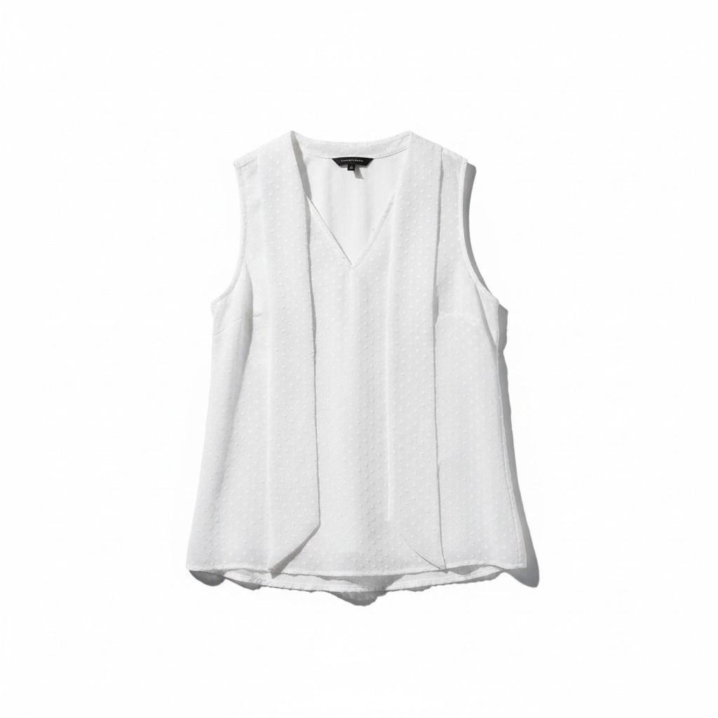 BANANA REPUBLIC CLIP DOT BLOUSE (Category: Sleeveless) located in Kalibo. Submitted by love.zuzu (Listing ID 1427750516, Image 1). Description: BANANA REPUBLIC CLIP DOT BLOUSE Price: 350 Size: M (can fit semi large) Condition: [9.5/10 — excellent condition, used once) Details: * Elegant off-white/ivory sleeveless blouse * Features a delicate "clip dot" (textured polka dot) pattern * Classy V-neckline with adjustable neck ties 🎀 * Flowy, lightwei