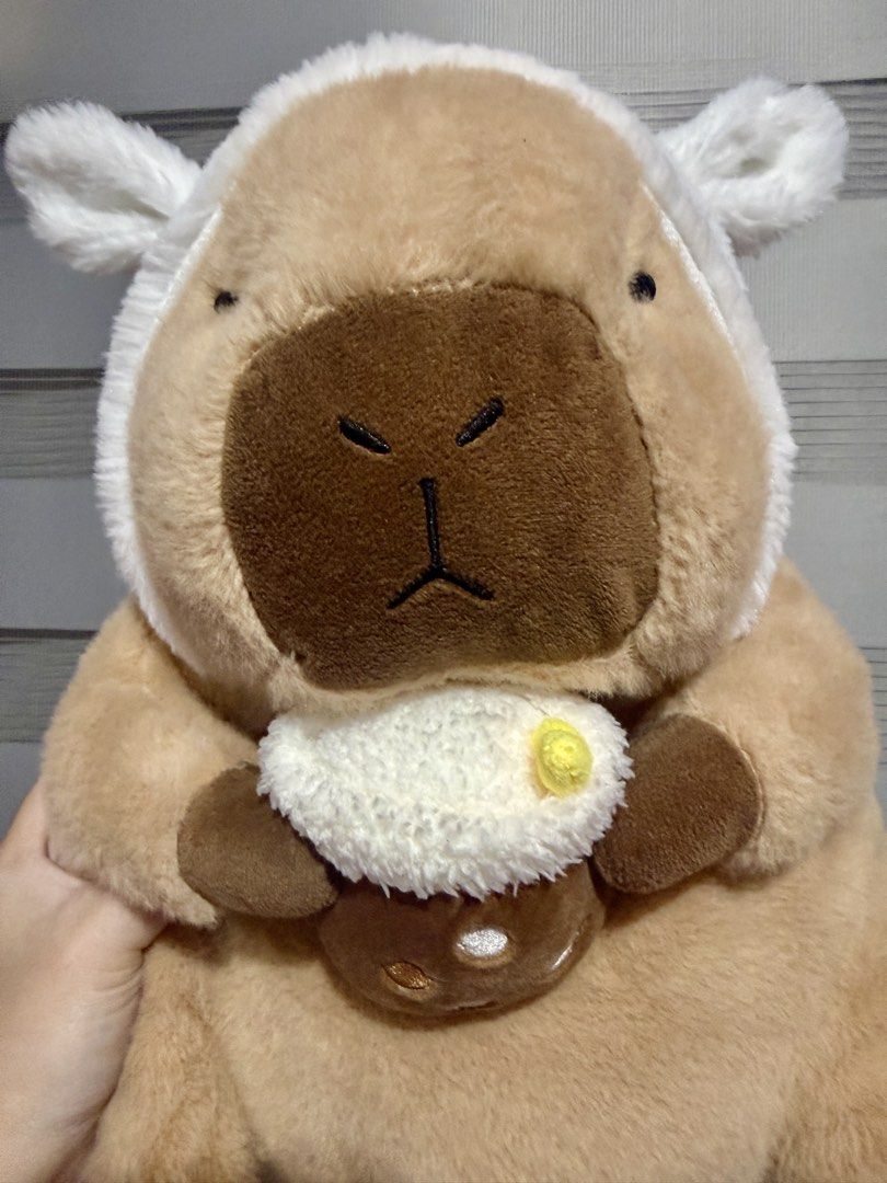 Capybara with milktea plush toy Big size (Category: Plushies & Soft Toys) located in Manila. Submitted by bcbg3217 (Listing ID 1430642124, Image 3). Description: Like new condition big size No etiketa Actual photos are posted No issues or flaws unless stated ⚠️NO INCLUSIONS (dustbag,tags etc.) Please check the photos thoroughly before placing an order JnT regular or Lalamove COD for Metro Manila ⚠️BUY AT YOUR OWN RISK⚠️ Prices are still negotiabl
