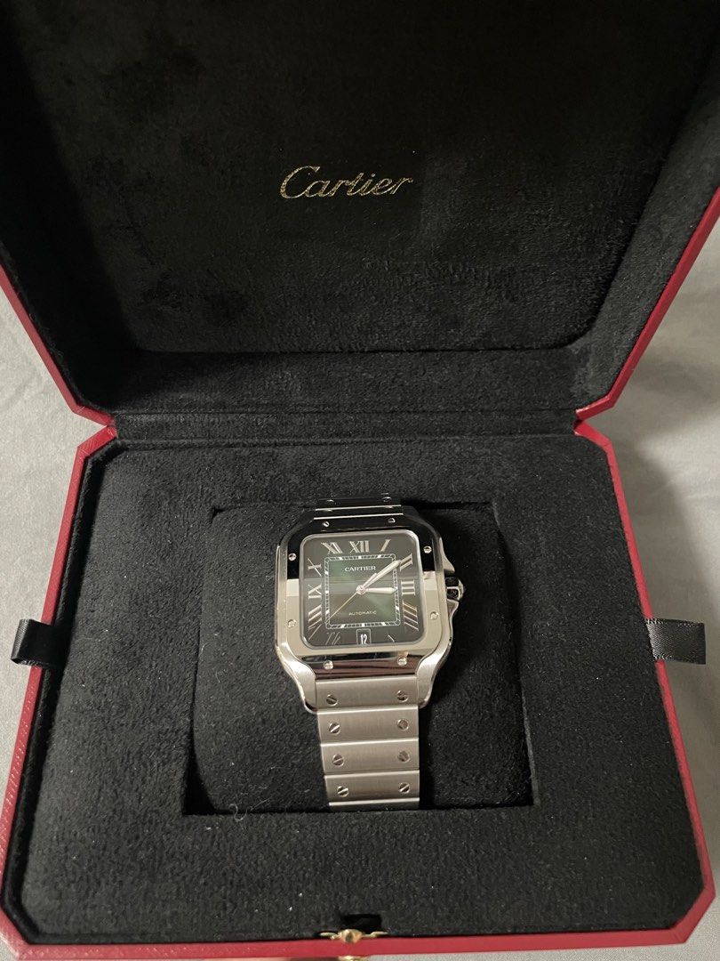 Cartier Santos Large (Green) (Category: Luxury Watches) located in Mandaluyong City. Submitted by rnvicencio (Listing ID 1430718876, Image 1). Description: SANTOS DE CARTIER LARGE (Green) • Includes original box, warranty card, link remover tool, and an additional green leather strap • Mint condition •Reference: WSSA0062 NEGOTIABLE.