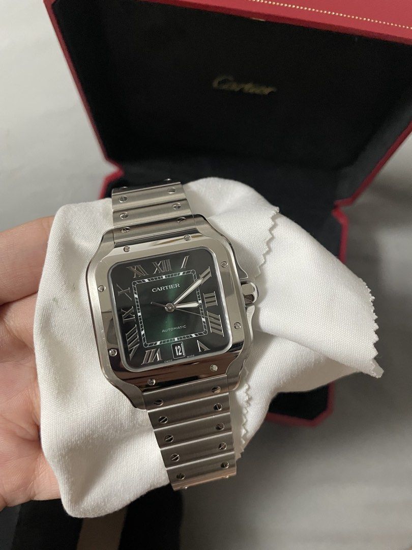 Cartier Santos Large (Green) (Category: Luxury Watches) located in Mandaluyong City. Submitted by rnvicencio (Listing ID 1430718876, Image 2). Description: SANTOS DE CARTIER LARGE (Green) • Includes original box, warranty card, link remover tool, and an additional green leather strap • Mint condition •Reference: WSSA0062 NEGOTIABLE.