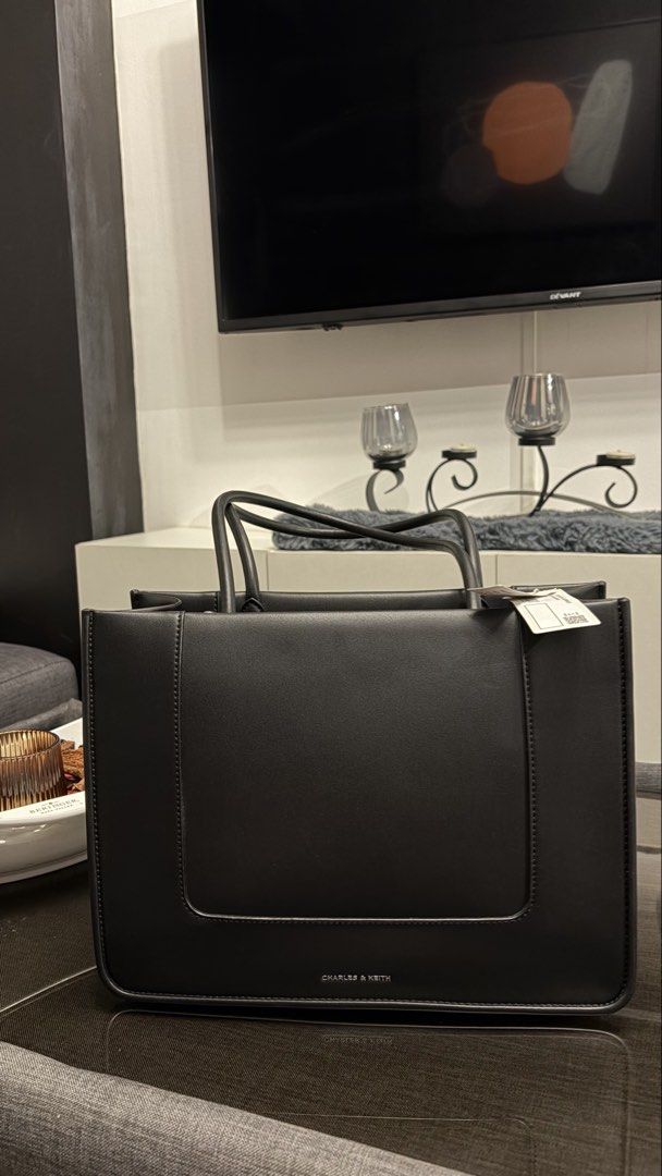 Charles & Keith Daylla Tote Bag (Category: Tote Bags) located in Paranaque City. Submitted by preamata (Listing ID 1430674460, Image 1). Description: Charles & Keith Daylla Tote Bag Used twice only. With tag. Original Price: 4,399.00.