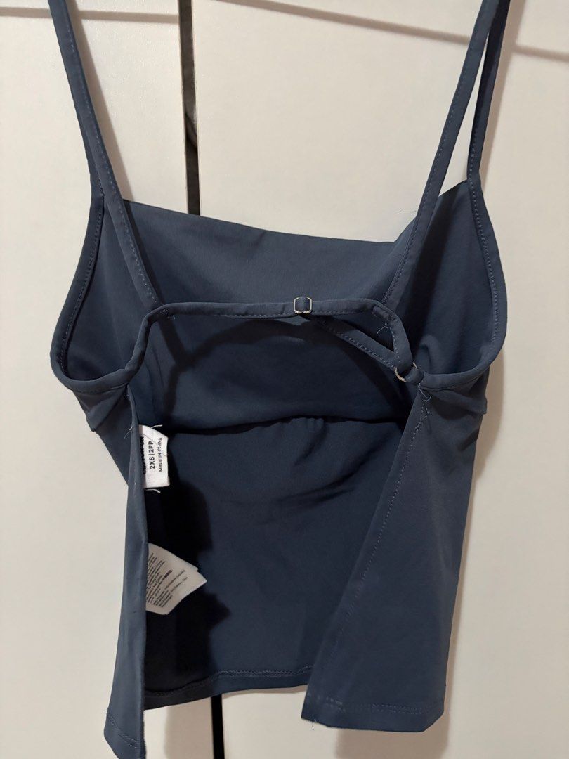 Cotton On Spaghetti Strap Backless Top (Category: Sleeveless) located in Manila. Submitted by helpherdeclutter (Listing ID 1430677649, Image 2). Description: used once only, can fit xs-s since the straps are adjustable very veryyyyyy nice .