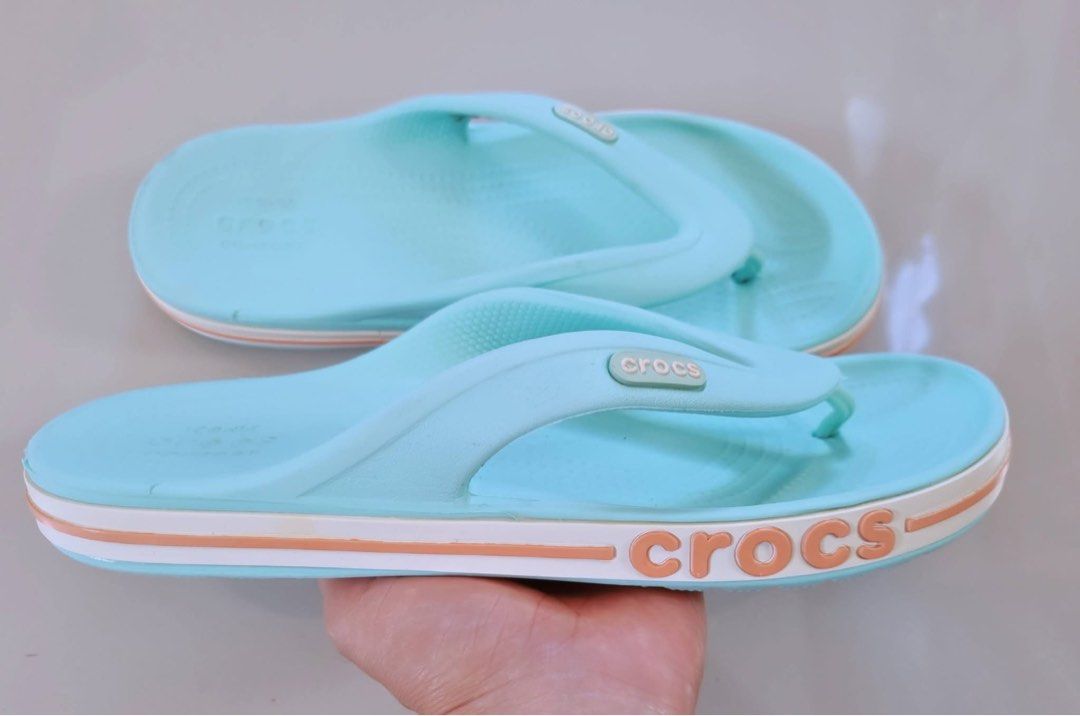 Crocs Women's Flip-Flops W8 (Category: Slippers and slides) located in Danao, Cebu. Submitted by altheaprelovedcorner (Listing ID 1430669892, Image 1). Description: - Crocs Women's Flip-Flops - Size: W8 - Color: Light Blue - Condition: Excellent - Comfortable design - Perfect for casual wear.