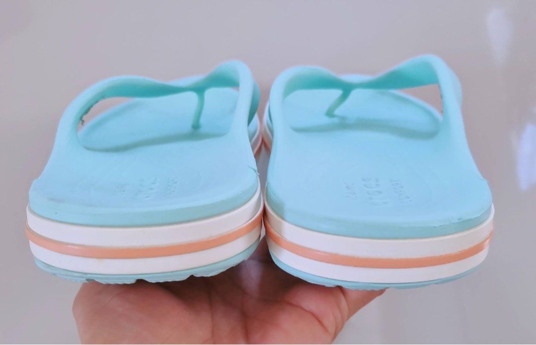 Crocs Women's Flip-Flops W8 (Category: Slippers and slides) located in Danao, Cebu. Submitted by altheaprelovedcorner (Listing ID 1430669892, Image 3). Description: - Crocs Women's Flip-Flops - Size: W8 - Color: Light Blue - Condition: Excellent - Comfortable design - Perfect for casual wear.