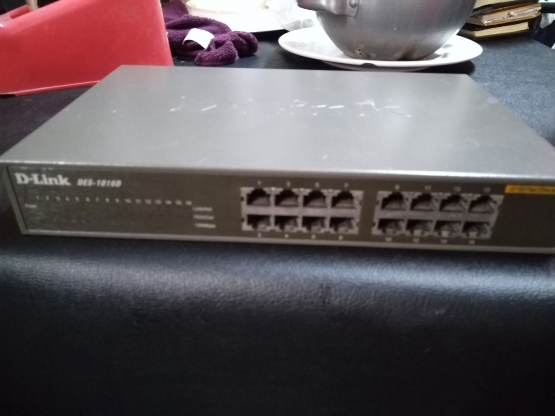 D-Link DES-1016D 16-Port Fast Ethernet Switch (Category: Cables & Adaptors) located in Manila. Submitted by maybonifacio (Listing ID 1430686878, Image 1). Description: D-Link DES-1016D 16-port Fast Ethernet switch. Features 16 RJ45 ports for network connectivity. Model number is DES-1016D. Hardware version is D4. Includes a power indicator and 10/100 Fast Ethernet ports. Made in China..