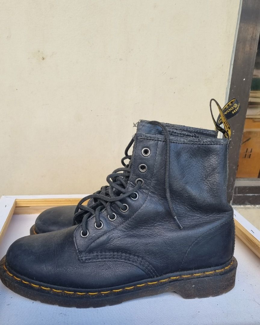 Dr. Martens Men's 1460 8 Eye Boots (Category: Boots) located in Manila. Submitted by mikemike2026 (Listing ID 1430737504, Image 3). Description: Original, made in Vietnam Doc Martens. Rarely used, just gathering dust in our shoe rack. Some leather flaking at the collar (see last photo). RFS: Too small for the owner..