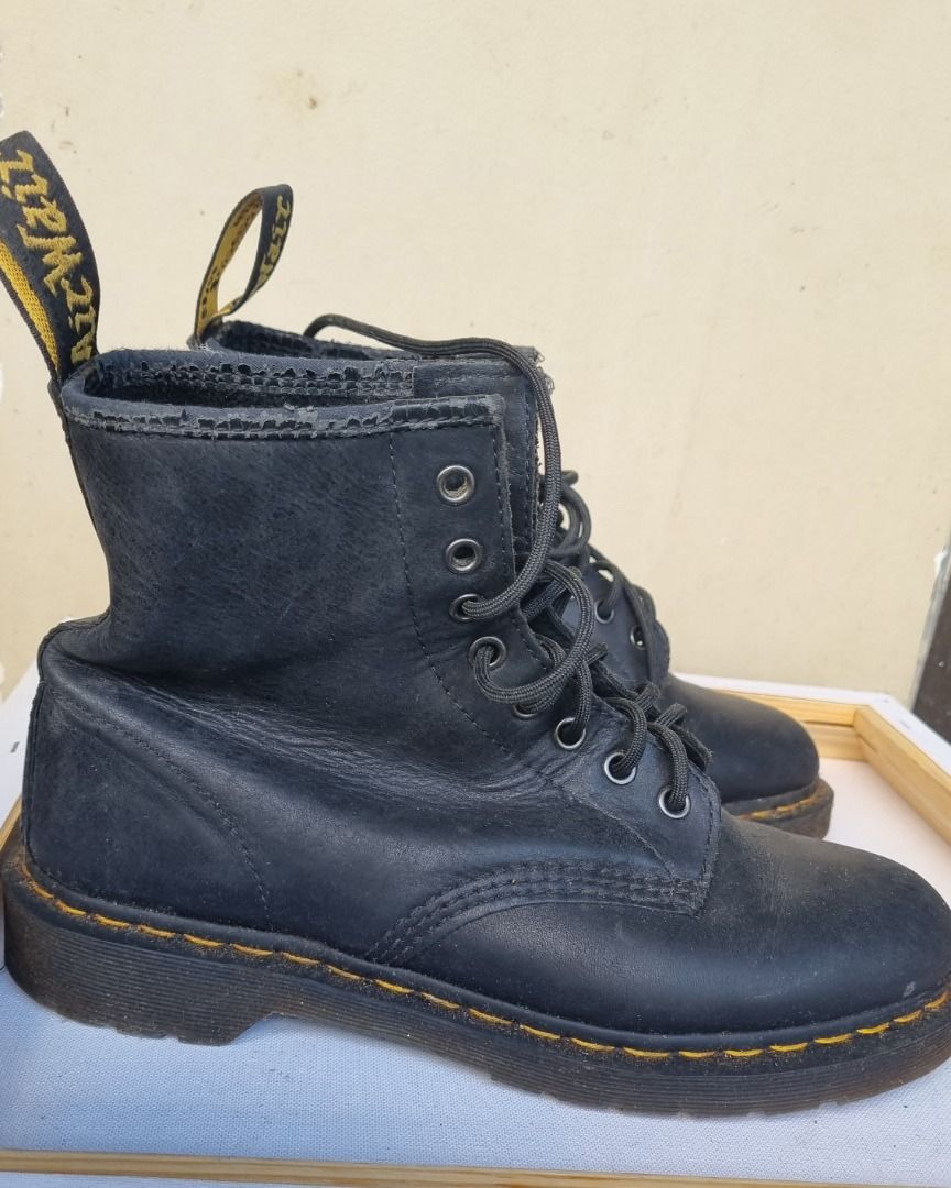 Dr. Martens Men's 1460 8 Eye Boots (Category: Boots) located in Manila. Submitted by mikemike2026 (Listing ID 1430737504, Image 1). Description: Original, made in Vietnam Doc Martens. Rarely used, just gathering dust in our shoe rack. Some leather flaking at the collar (see last photo). RFS: Too small for the owner..