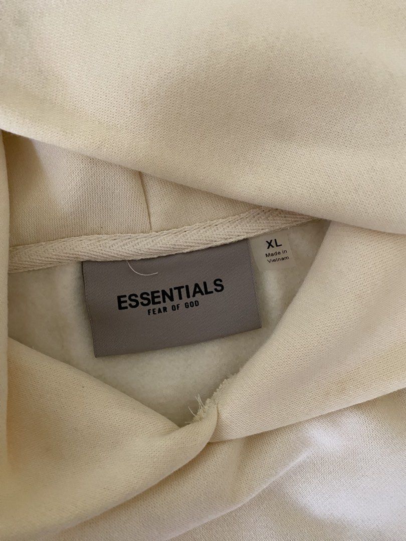 Essentials Fear of God Hoodie XL (Category: Hoodies) located in Bacolor. Submitted by gavsclutter (Listing ID 1430621948, Image 2). Description: Worn once only. Has light stains around the sleeve and hoodie area. Rfs: decluttering stuff.
