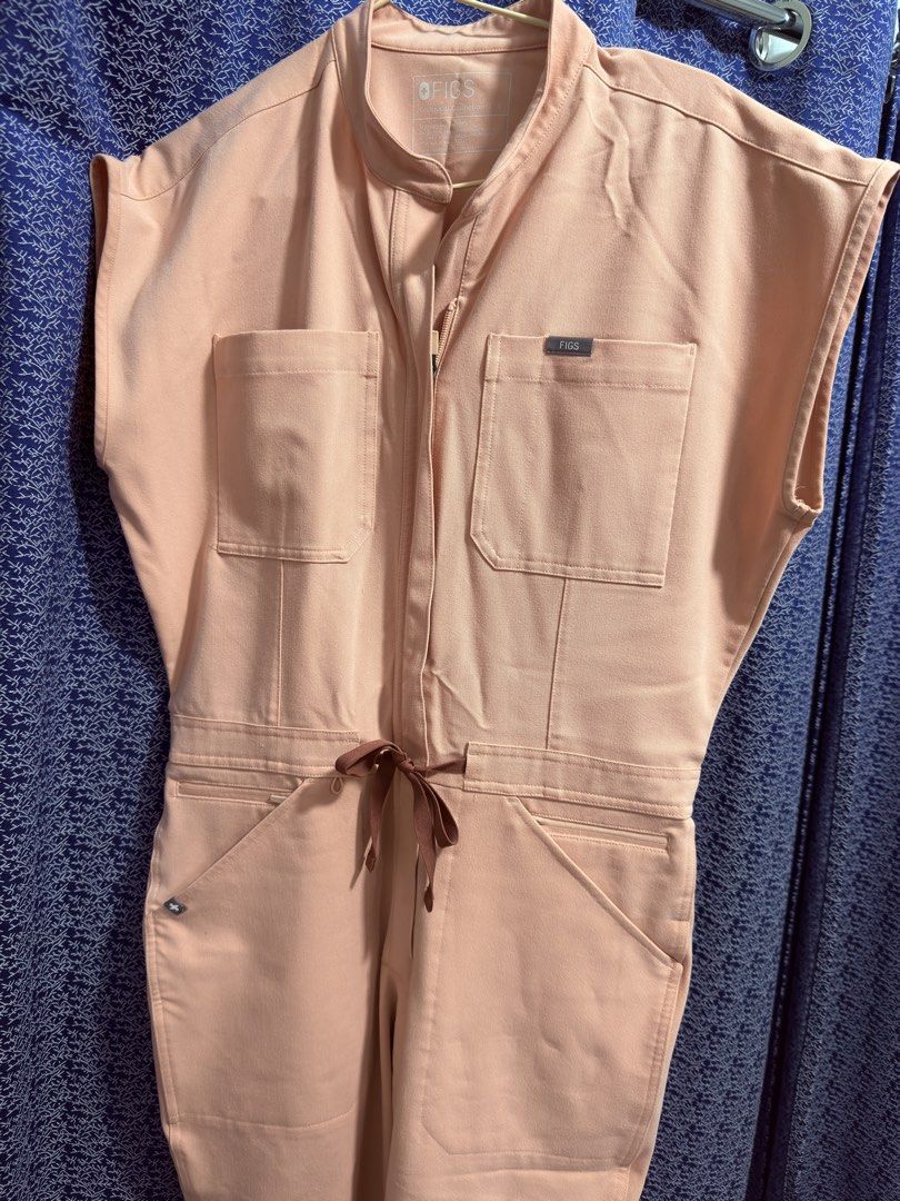 FIGS Pink Sand Rafaela - Scrub Jumpsuit SMALL regular (Category: Jumpsuits) located in Mandaluyong City. Submitted by riz24 (Listing ID 1430724964, Image 2). Description: Lightly used FIGS Scrub Jumpsuit Color: Pink Sand Size: Small RFS: decluttering.