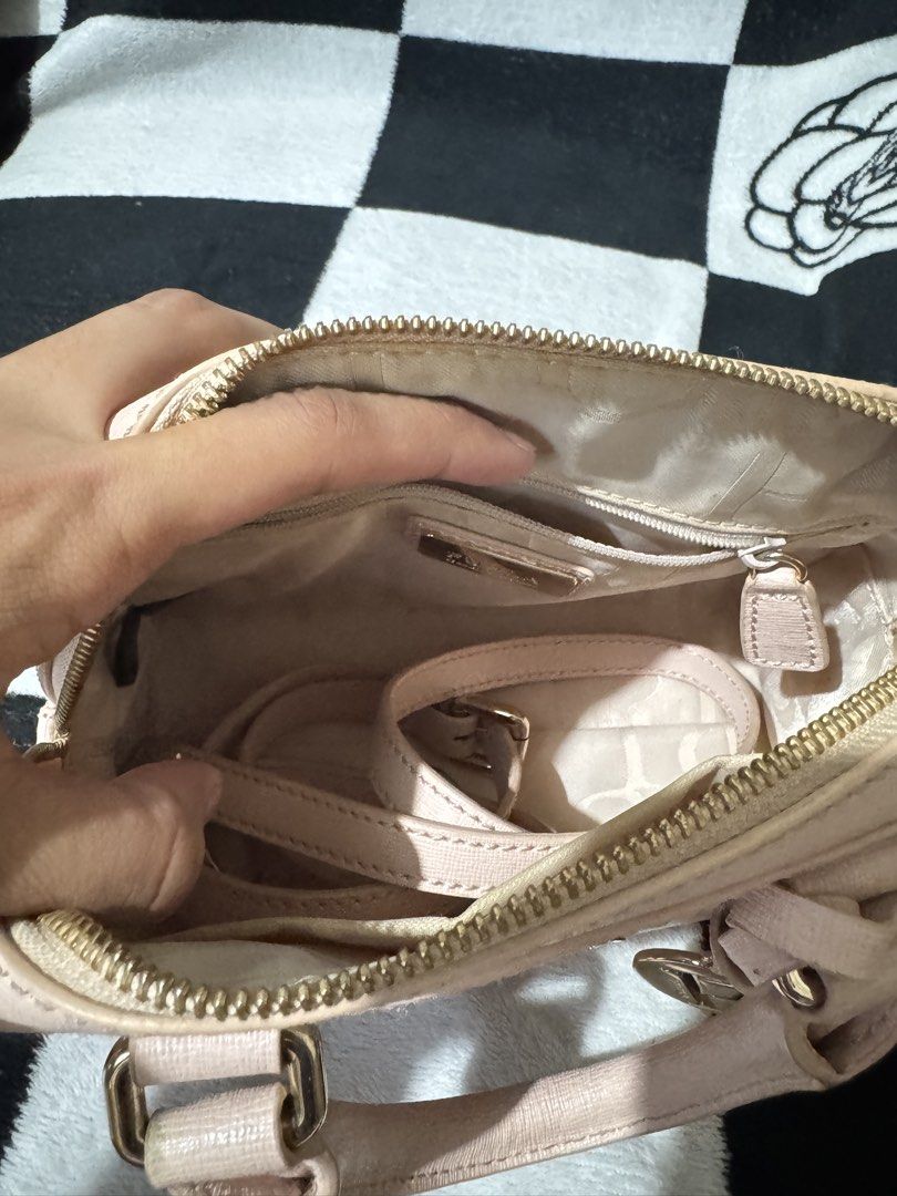 Furla Pink Mini Satchel Bag (Category: Luxury Bags & Wallets) located in Makati City. Submitted by prelovedbyhaillie (Listing ID 1430739008, Image 3). Description: Flaws - has some excess glue Loc : Makati City Mod : Lalamove or J&T Mop : Gcash.