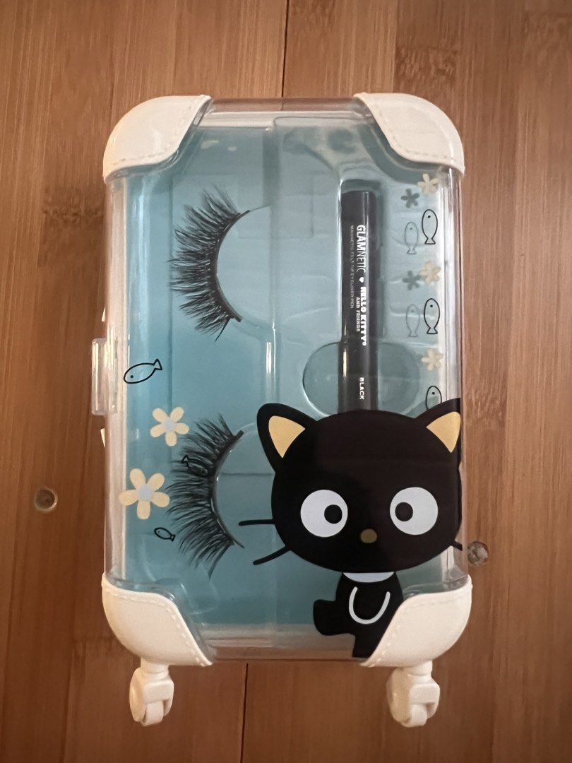 Glamnetic Hello Kitty Magnetic Eyelashes (Category: Makeup) located in San Pablo. Submitted by posh_closet_cleanup (Listing ID 1430784370, Image 1). Description: Authentic and BNEW in box Acrylic packaging not in good shape but item is in BNEW condition. Photo with remote control shows size comparison. .