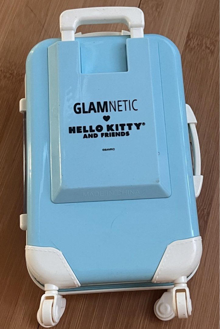 Glamnetic Hello Kitty Magnetic Eyelashes (Category: Makeup) located in San Pablo. Submitted by posh_closet_cleanup (Listing ID 1430784370, Image 2). Description: Authentic and BNEW in box Acrylic packaging not in good shape but item is in BNEW condition. Photo with remote control shows size comparison. .
