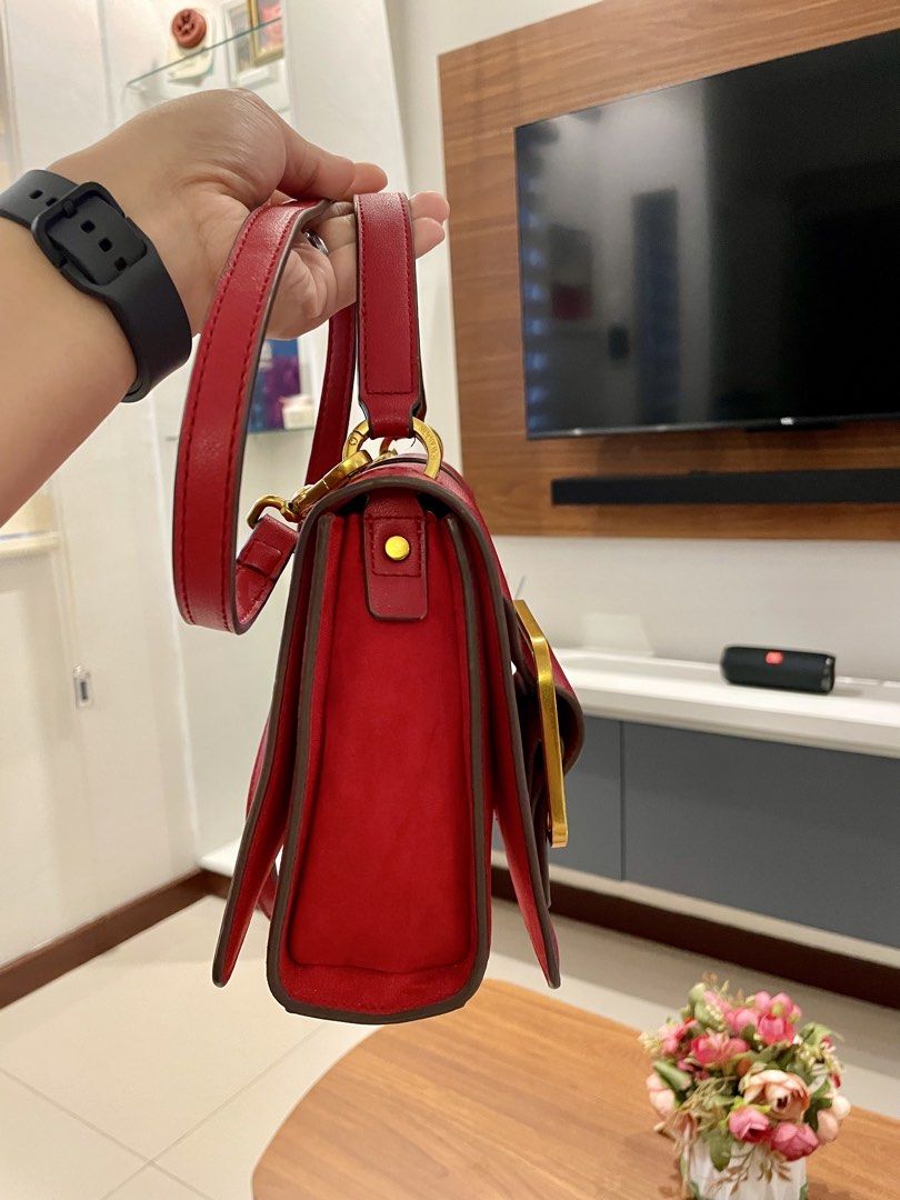 HAVVMOON Red Handbag with Gold Buckle (Category: Luxury Bags & Wallets) located in Paranaque City. Submitted by ol.authentic.ph (Listing ID 1430636445, Image 2). Description: 100% Original Havmoon. Genuine Leather in Excellent Condition. Classy Red Day to Night Bag. Front and Back Flap Magnetic lock. Perfect Gold-tone Hardware Condition. Crossbody Strap, 101% Prisitine. Suede inside. Scratch proof. ** Message me. I can slightly negotiate. Preferr