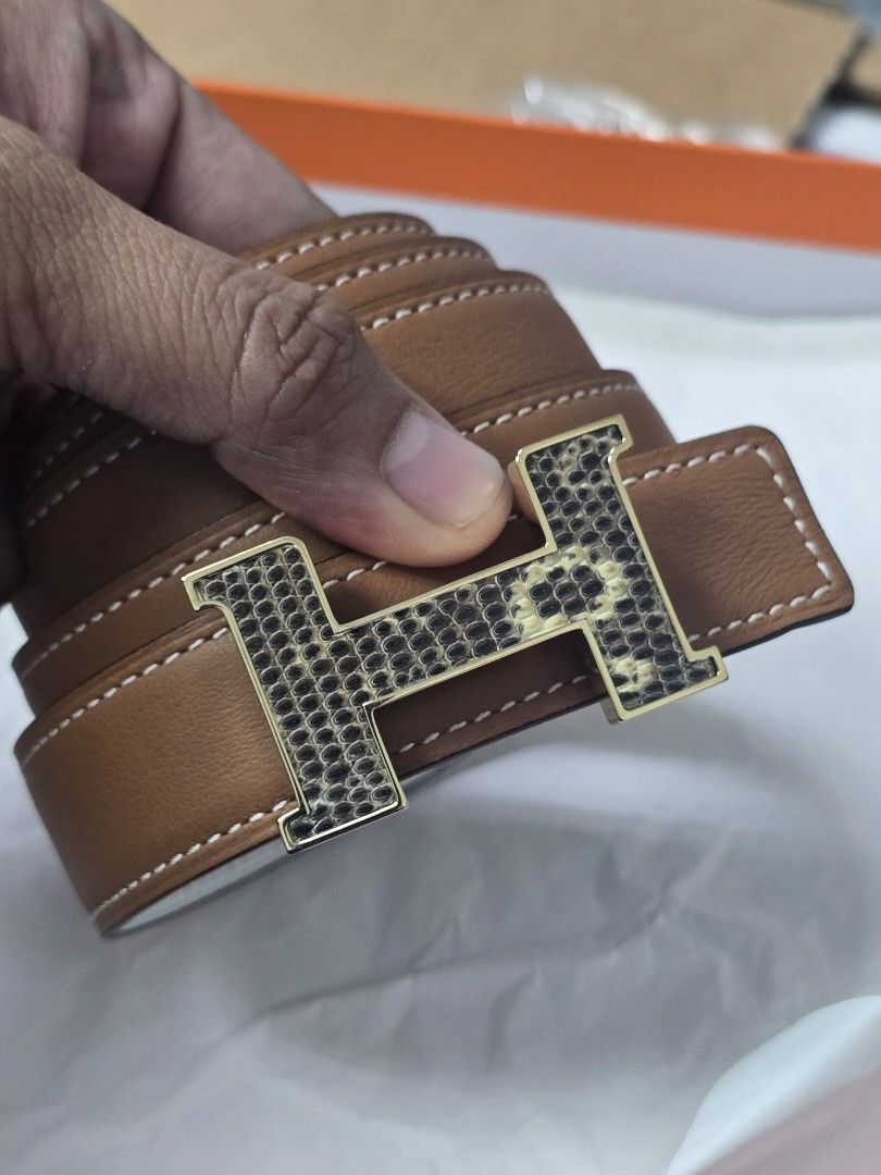 Hermes Gold/Blanc Mini Constance Lizard Buckle Belt (Category: Luxury Accessories) located in Taguig. Submitted by mluxeph (Listing ID 1430654785, Image 1). Description: Hermes Gold/Blanc Mini Constance Lizard Buckle Belt Gender: Ladies’ Material: Swift and epsom calfskin leather Stamp: D (no square) Year: 2019 Measurements: 85 (Hermes size) , 32.5” / 82.5cm (tight fitting) , 39.25" / 99.7cm (full length) Width: 1" / 2.5cm Hardware: Gold tone Inc