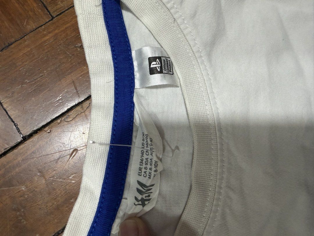 H&M PlayStation T-shirt (Category: Babies & Kids Fashion) located in Taguig. Submitted by krnflks_ (Listing ID 1430768872, Image 3). Description: H&M Shirt Licensed Playstation 8-10 yrs old .