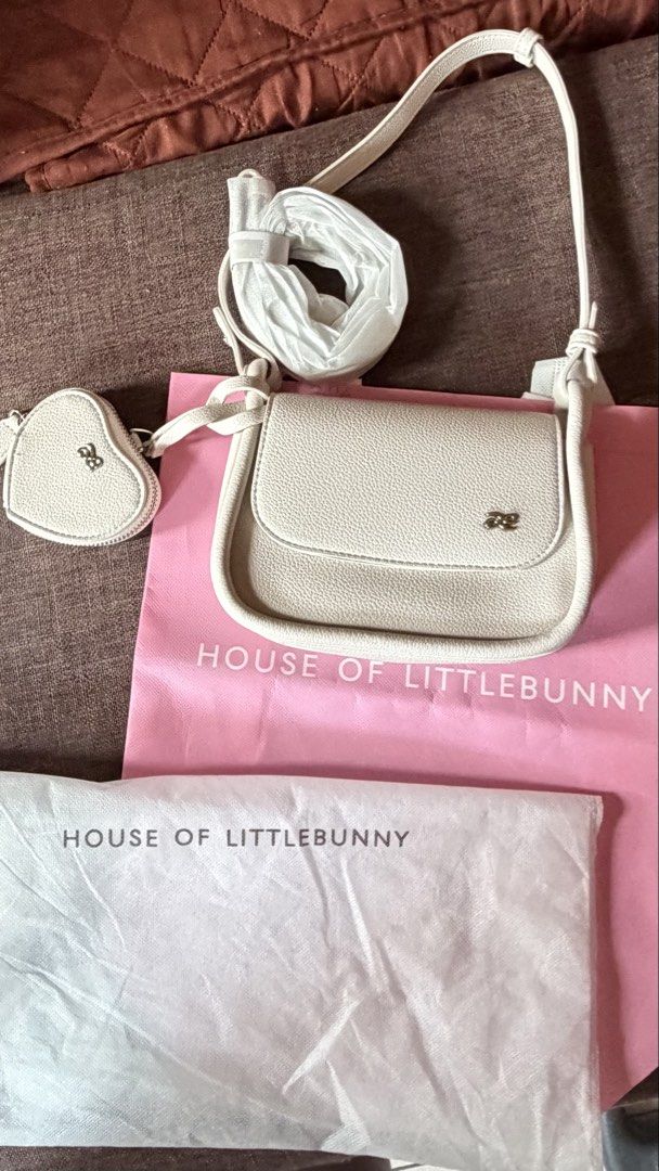 PRELOVED HOLB MINI PENELOPE FOR SALE (Category: Cross-body Bags) located in Angeles City. Submitted by joshlp (Listing ID 1430607006, Image 2). Description: BRAND NEW HOLB MINI PENELOPE WITH HEART WALLET (WHITE COLOR) Bought in BKK last 4/5/26 Last price already.