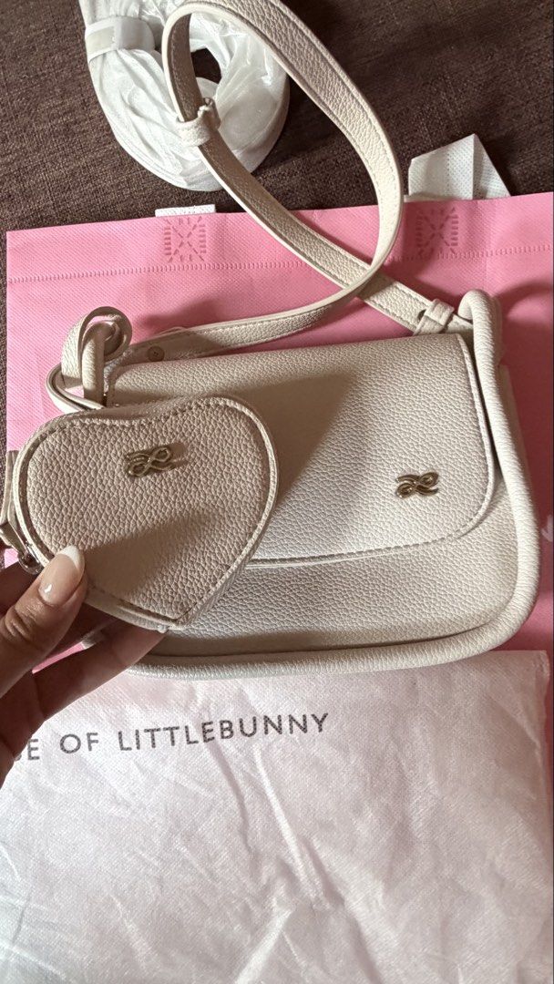PRELOVED HOLB MINI PENELOPE FOR SALE (Category: Cross-body Bags) located in Angeles City. Submitted by joshlp (Listing ID 1430607006, Image 3). Description: BRAND NEW HOLB MINI PENELOPE WITH HEART WALLET (WHITE COLOR) Bought in BKK last 4/5/26 Last price already.