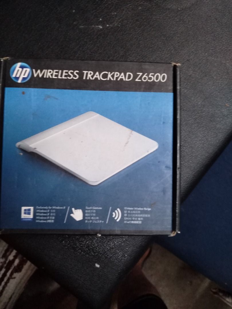 HP Wireless Trackpad Z6500 (Category: Mouse & Mousepads) located in Manila. Submitted by maybonifacio (Listing ID 1430687744, Image 1). Description: HP Wireless Trackpad Z6500. Compatible with Windows 8. Features touch gestures and wireless range. The trackpad is silver in color. The box includes the trackpad itself. The bottom of the trackpad has the HP logo and some product information..