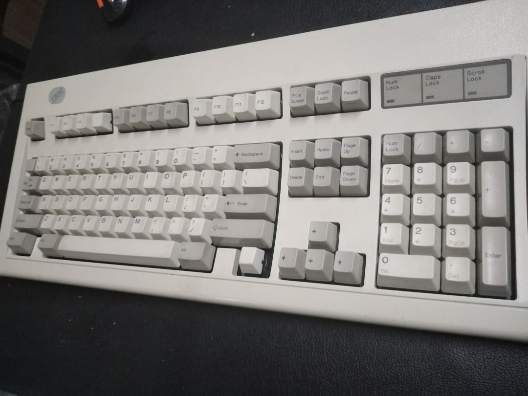IBM Lexmark Mechanical Keyboard (Category: Computer Keyboard) located in Manila. Submitted by maybonifacio (Listing ID 1430692375, Image 2). Description: Vintage IBM Lexmark mechanical keyboard. Features a full-size layout with a numeric keypad. Manufactured by Lexmark. Part number 52G9658. Made in USA. Production date of July 27, 1993. Includes the IBM logo on the top left corner. The keycaps are a light beige color. AS IS .
