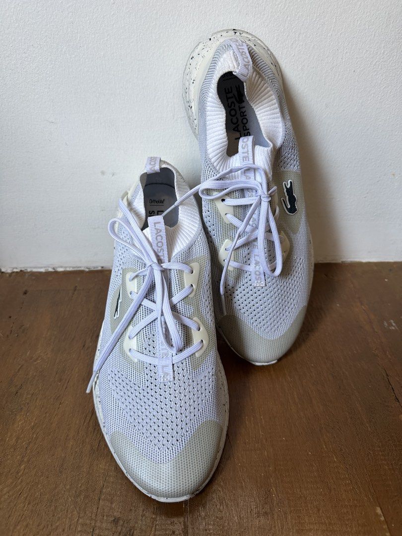 Lacoste Neo Run Eco Sneakers - White (Category: Sneakers) located in Rizal. Submitted by sal.bear (Listing ID 1430645048, Image 1). Description: Lacoste Neo Run Eco sneakers in white. Features a knitted upper, lace-up closure, and speckled sole. Includes Ortholite comfort foam insoles. The size is UK 6.5, EUR 40, and USA 8.5. Made in Vietnam. Never been used. Given as a gift from US. No box included. Obvious discoloration from storage. SRP from w