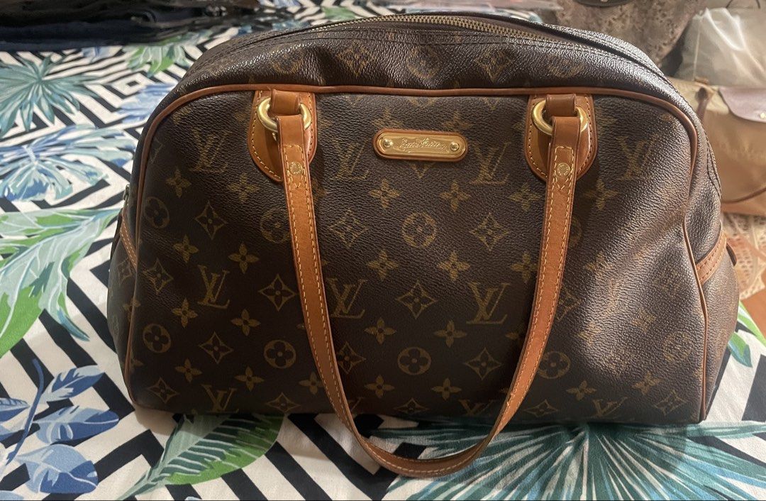 Louis Vuitton Montorgueil GM (Category: Luxury Bags & Wallets) located in Paranaque City. Submitted by tweedle_dum (Listing ID 1430759136, Image 1). Description: Authentic LV Montorgueil GM size 8/10 condition Clean interior Usual honey patina color Light weight & very spacious Monogram leather NO FOUL SMELL RFS: Barely used anymore, just stored in the closet. I DON’T OWN any fake / replica bags Willing to meet up for SURE BUYERS (Within Makati m