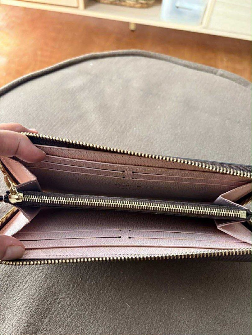 Louis Vuitton Zippy Wallet (Category: Luxury Bags & Wallets) located in Santa Rosa. Submitted by rjaarmblo (Listing ID 1430747417, Image 2). Description: Authentic Louis Vuitton Zippy Wallet in classic Monogram canvas. Features a zip-around closure and a pink leather interior. Includes multiple card slots and compartments for bills and coins. Comes with the original Louis Vuitton box. A stylish and practical accessory for everyday use. Lightly us