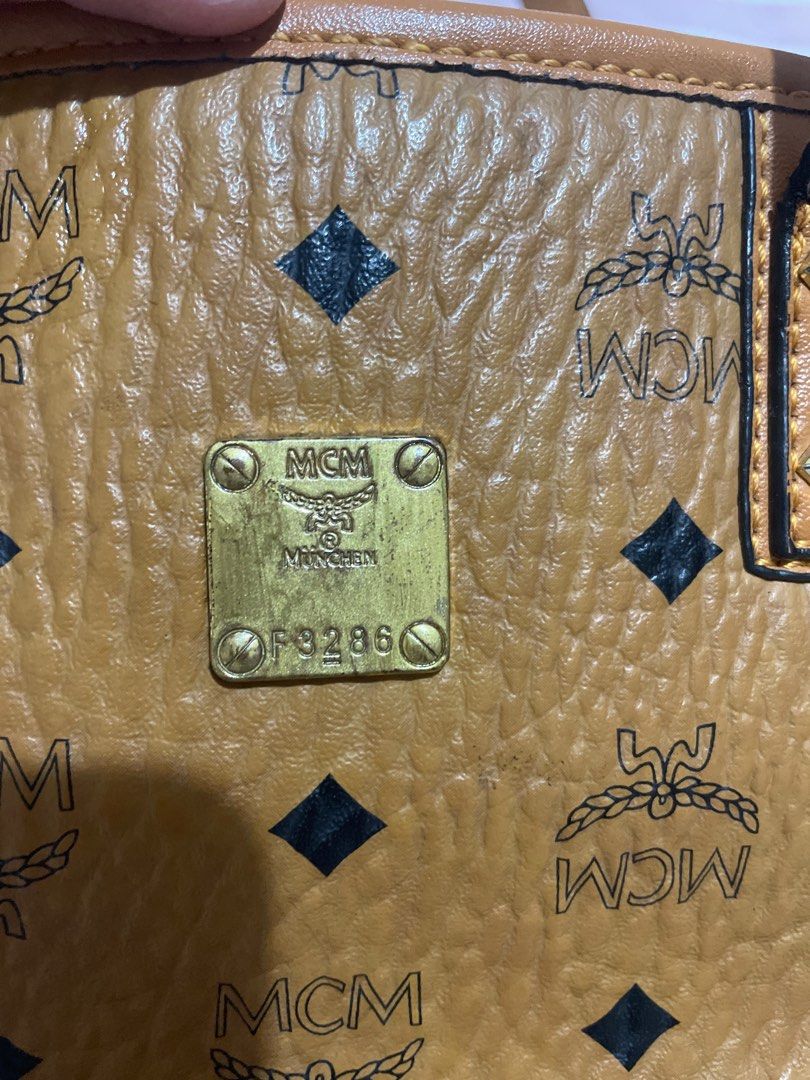 MCM sling bag (Category: Luxury Bags & Wallets) located in Makati City. Submitted by shemiyu (Listing ID 1430744725, Image 3). Description: MCM Cognac Mini Tote with sling Source: Korea Height: 17 cm Width: 25 cm.