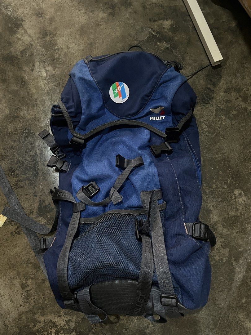 Millet GR 30 Backpack (Category: Backpacks) located in Bulacan. Submitted by sef19 (Listing ID 1430629428, Image 1). Description: Millet GR 30 backpack in navy blue. Features multiple compartments and adjustable straps. Includes a mesh pocket and the "P Foam Air Contact" system. Made in Vietnam. Model number MO2327. Manufactured in January 1998. The backpack has the Millet logo on the front..