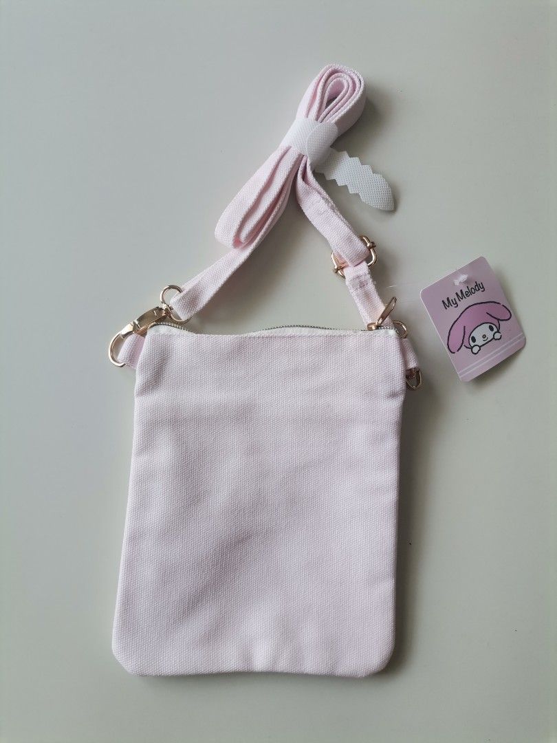 My Melody Crossbody Bag (Category: Cross-body Bags) located in Pasig City. Submitted by cae.025 (Listing ID 1430607976, Image 2). Description: Kawaii My Melody canvas crossbody sling bag from Japan 🇯🇵 ~ BNWT (brand-new with tag) ~ PM for inquiries MOP: thru BDO or gcash only. MOD: lalamove or grab c/o buyer. Thank You. .
