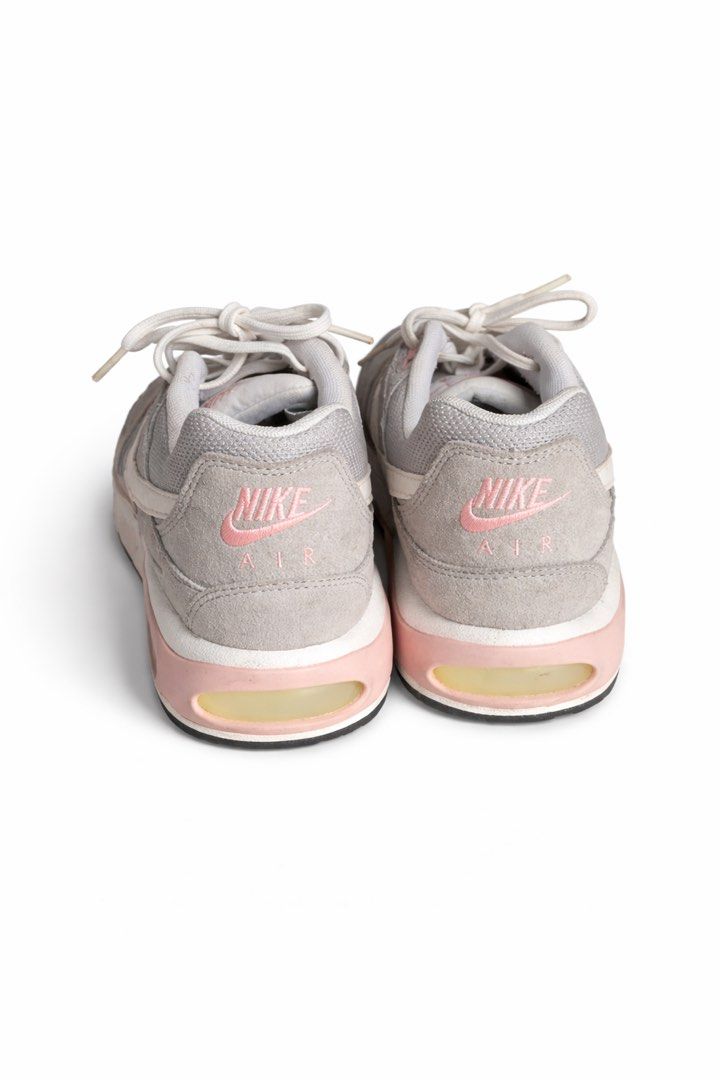 Nike Air Max Light Grey Pink Sneakers (Category: Sneakers) located in Antipolo. Submitted by cl026 (Listing ID 1430662511, Image 3). Description: - Nike Air Max sneakers - Color: Grey and Pink - Size: US 9 - Upper: Mesh and Suede - Features: Visible Air Max unit, white laces and swoosh, pink accents - Condition: Soles show slight wear.