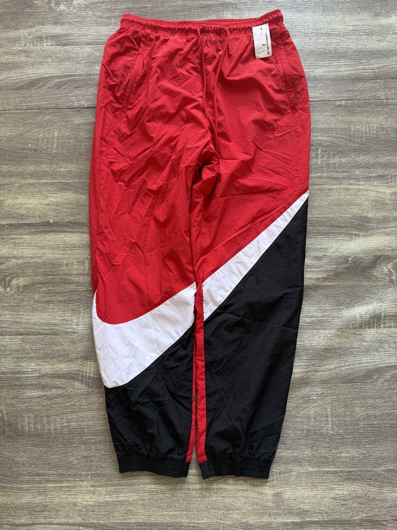 Nike Big Swoosh Woven Pants (Category: Joggers) located in Calumpit. Submitted by Essentiality (Listing ID 1430725355, Image 1). Description: Nike Big Swoosh Size Medium W - 28 L - 38 Authentic Excellent Condition 2k.