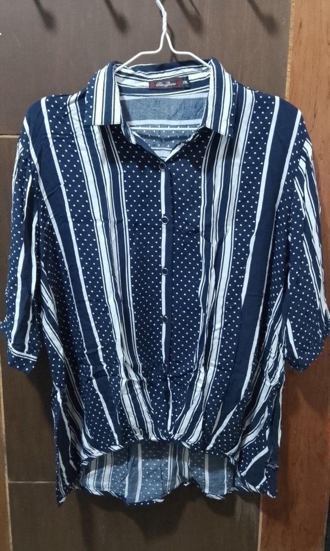 Paddock's Navy 3/4 Sleeved Striped and Dotted Button-Up Blouse (Category: Blouses) located in Taguig. Submitted by flidethechemist (Listing ID 1430795728, Image 1). Description: Used it once, then stored it. The bottom is actually sewed together, so you have to put it on like a shirt to make it fit. 📏 Measurements: 📍Shoulder width: 40 cm 📍Arm length: 35 cm 📍Arm width: 23 cm 📍Body length: 65 cm 📍Body width: 62 cm 🔨 Material: 📍100% Viscose 