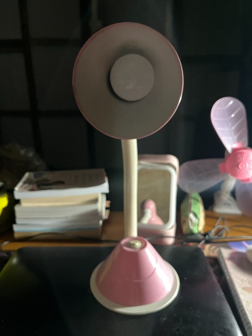 Desk Lamp (Category: Lighting) located in Buenavista. Submitted by marystyle (Listing ID 1430722475, Image 2). Description: Flexible desk lamp LIGHTLY USED, perfect for your study table or workspace. RFS: no longer needed Features: * flexible neck for easy adjustment and a bright light. * has a pink base and a white lampshade. * great addition to any desk setup, providing focused illumination for reading, studying, or working. BDO or Gcash/Mariba