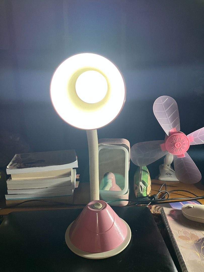 Desk Lamp (Category: Lighting) located in Buenavista. Submitted by marystyle (Listing ID 1430722475, Image 3). Description: Flexible desk lamp LIGHTLY USED, perfect for your study table or workspace. RFS: no longer needed Features: * flexible neck for easy adjustment and a bright light. * has a pink base and a white lampshade. * great addition to any desk setup, providing focused illumination for reading, studying, or working. BDO or Gcash/Mariba