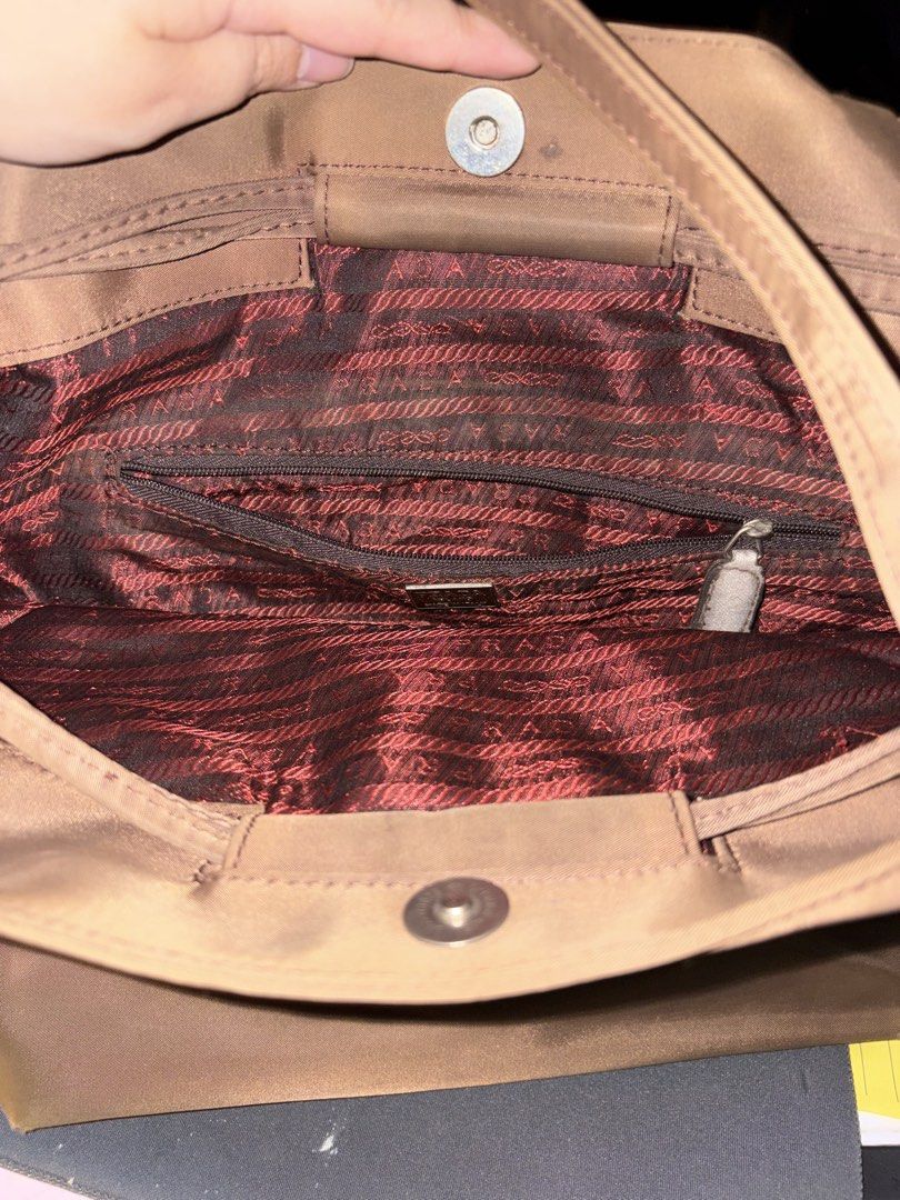 Prada Brown Tote Bag (Category: Luxury Bags & Wallets) located in Quezon. Submitted by squishymallows (Listing ID 1430727514, Image 2). Description: - drawstring - vintage DM for more info.
