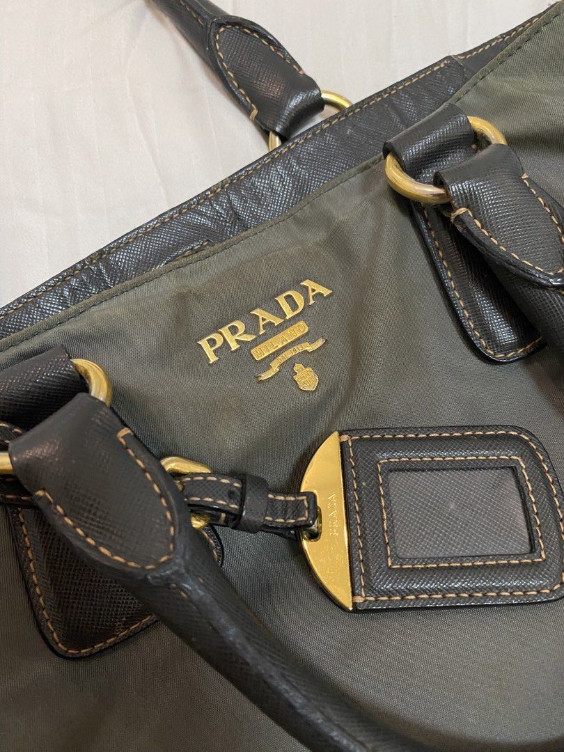 Prada Nylon Tote Bag (Category: Luxury Bags & Wallets) located in Manila. Submitted by dandrelucas01 (Listing ID 1430628114, Image 2). Description: Prada Nylon Tote Bag, no sling Rank AB Can deliver through lalamove, j&t, and LBC Slightly nego for sure buyers.