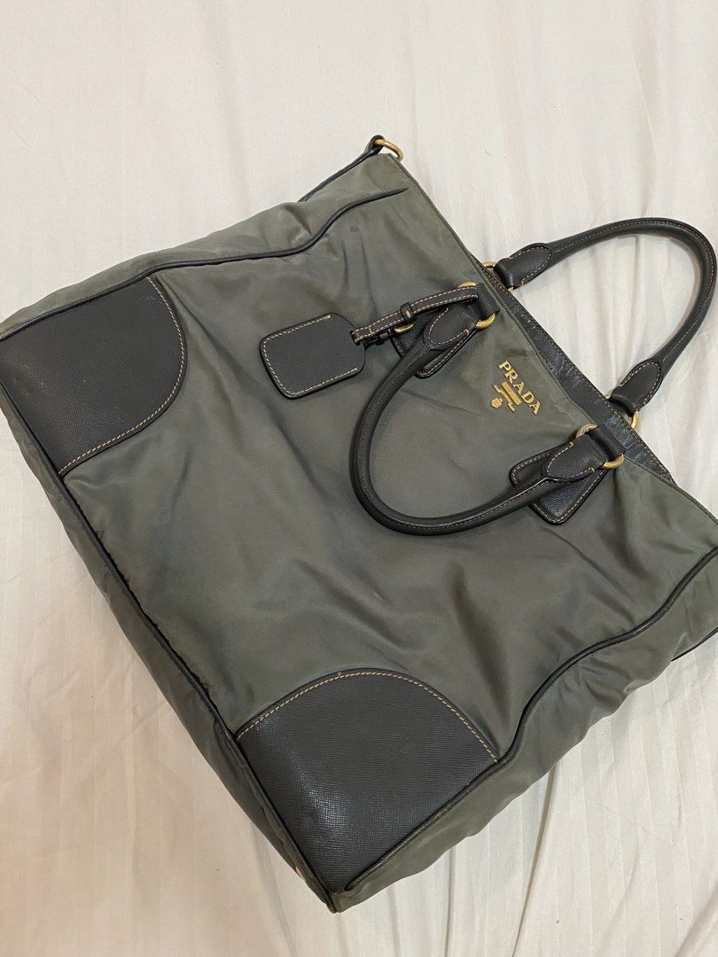 Prada Nylon Tote Bag (Category: Luxury Bags & Wallets) located in Manila. Submitted by dandrelucas01 (Listing ID 1430628114, Image 1). Description: Prada Nylon Tote Bag, no sling Rank AB Can deliver through lalamove, j&t, and LBC Slightly nego for sure buyers.