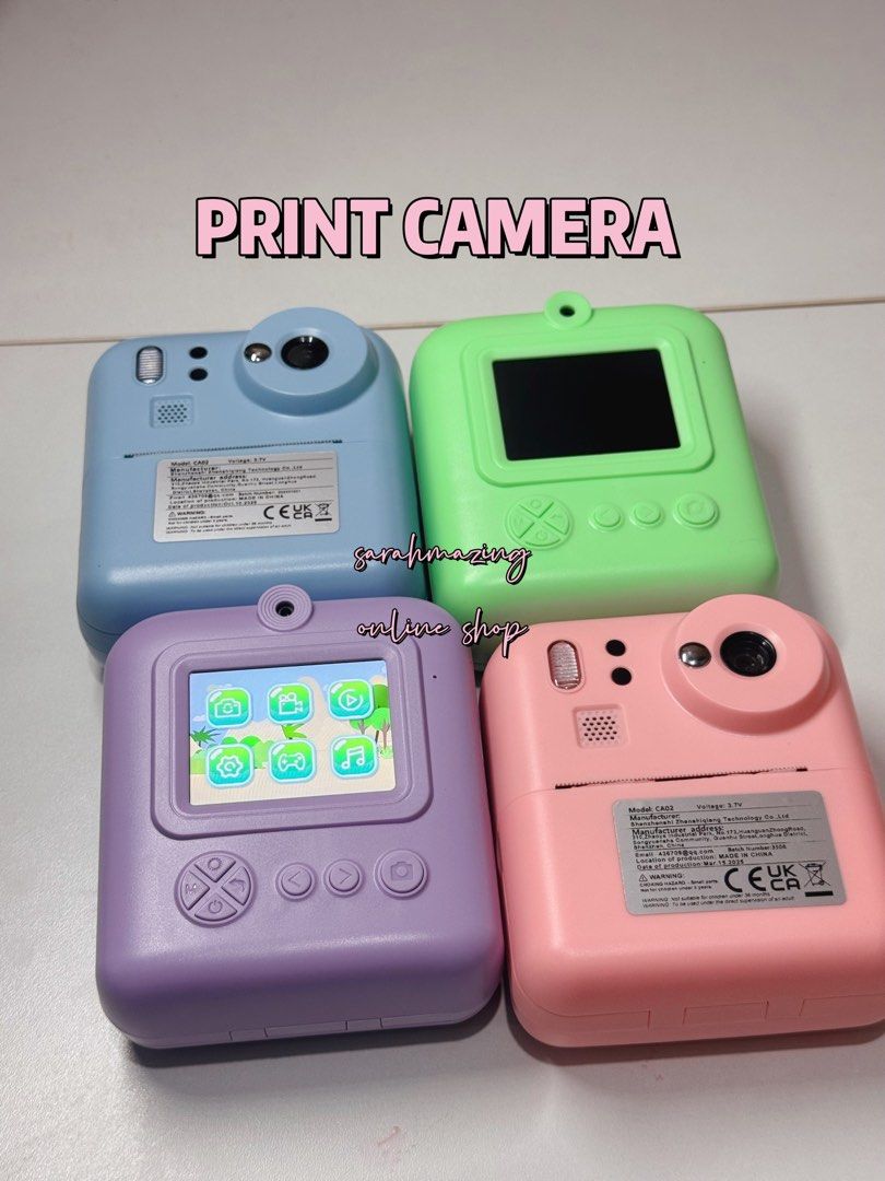 Print Camera - Dual Cam (Category: Cameras) located in Cabuyao City. Submitted by sarahmazingonlineshop (Listing ID 1430752963, Image 2). Description: - Instant print camera in multiple colors - Ink-free printing - Dual camera (front and back) - Includes: - 32GB SD card - 8 rolls of thermal paper - Lanyard - Charging cable - Sample prints - Perfect for instant photos!.