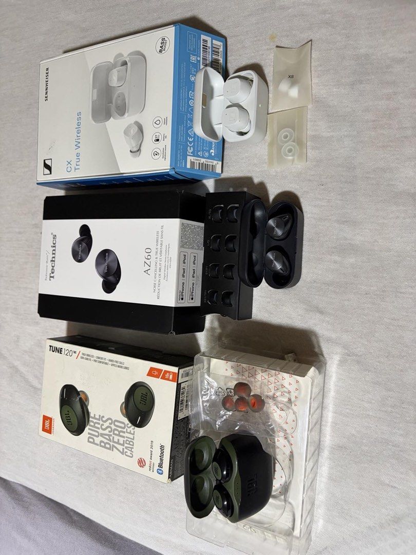 Sennheiser CX True Wireless, Technics AZ60, JBL Tune 120 (Category: Earphones) located in Manila. Submitted by muddyyys.eli (Listing ID 1430776734, Image 1). Description: - Sennheiser CX True Wireless (White) - Technics AZ60 (Black) - JBL Tune 120 (Green) - All earphones include: - Original boxes - Accessories - Extra ear tips - Images show charging cases. TAKE ALL FOR 12k.