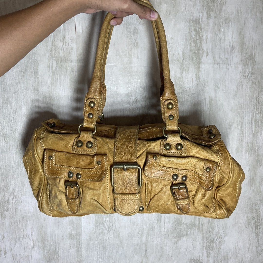 SISLEY BAG (Category: Luxury Bags & Wallets) located in Pagadian. Submitted by urdripchoice (Listing ID 1430794884, Image 1). Description: SISLEY BAG 8.9/10 CONDITION Issue: missing buttons, scratches ₱900 FREE SHIPPING Location: Pagadian City Mod: Jnt Mop: Gcash.